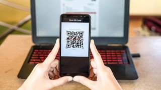 Scanning a QR code on a computer with a phone