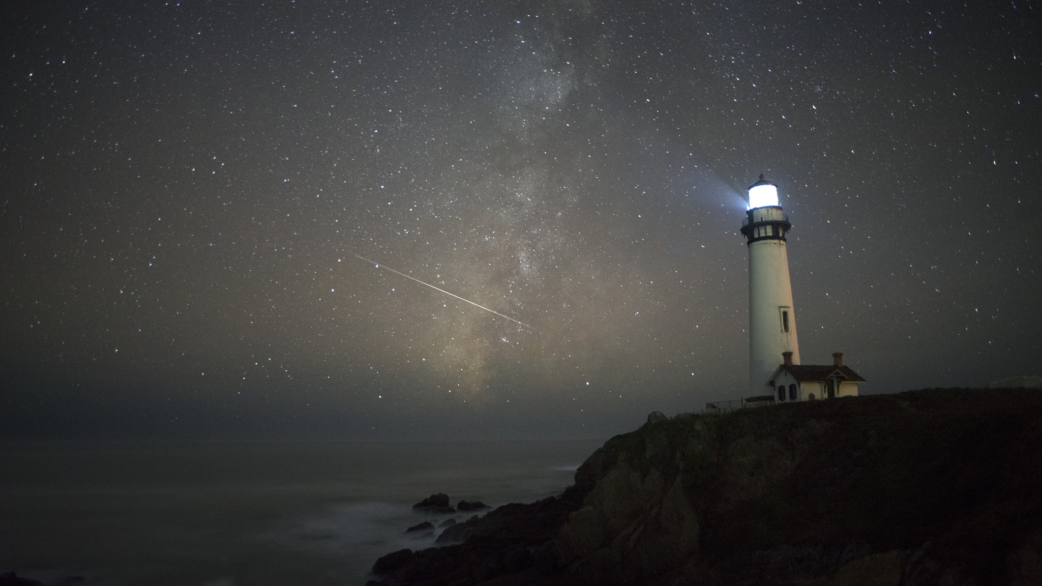 An Orionid meteor shoots through the pigeon point lighthouse pescadero, california