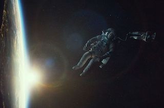George Clooney and Sandra Bullock star as astronauts in "Gravity," director Alfonso Cuarón's new film being released by Warner Bros. Pictures on Oct. 4, 2013.
