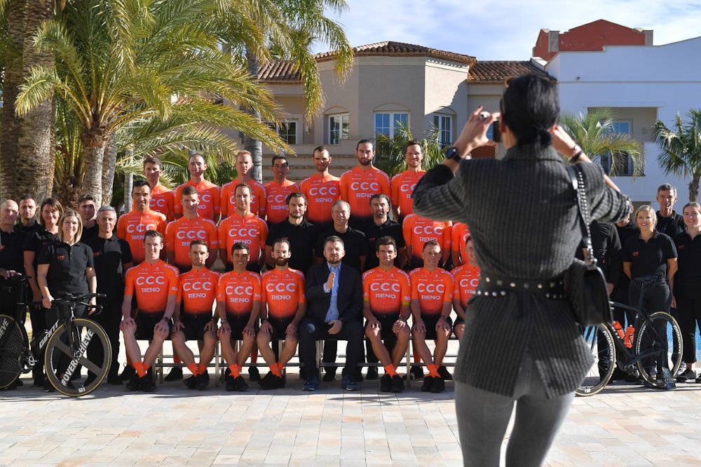 Valeriya Musina, wife of CCC Team onwer and CEO Dariusz Miek, snaps a photo of the team