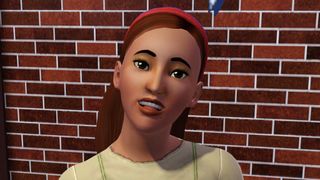 The Sims 3 - A sim wears a headband and a green top smiling in front of a brick wall