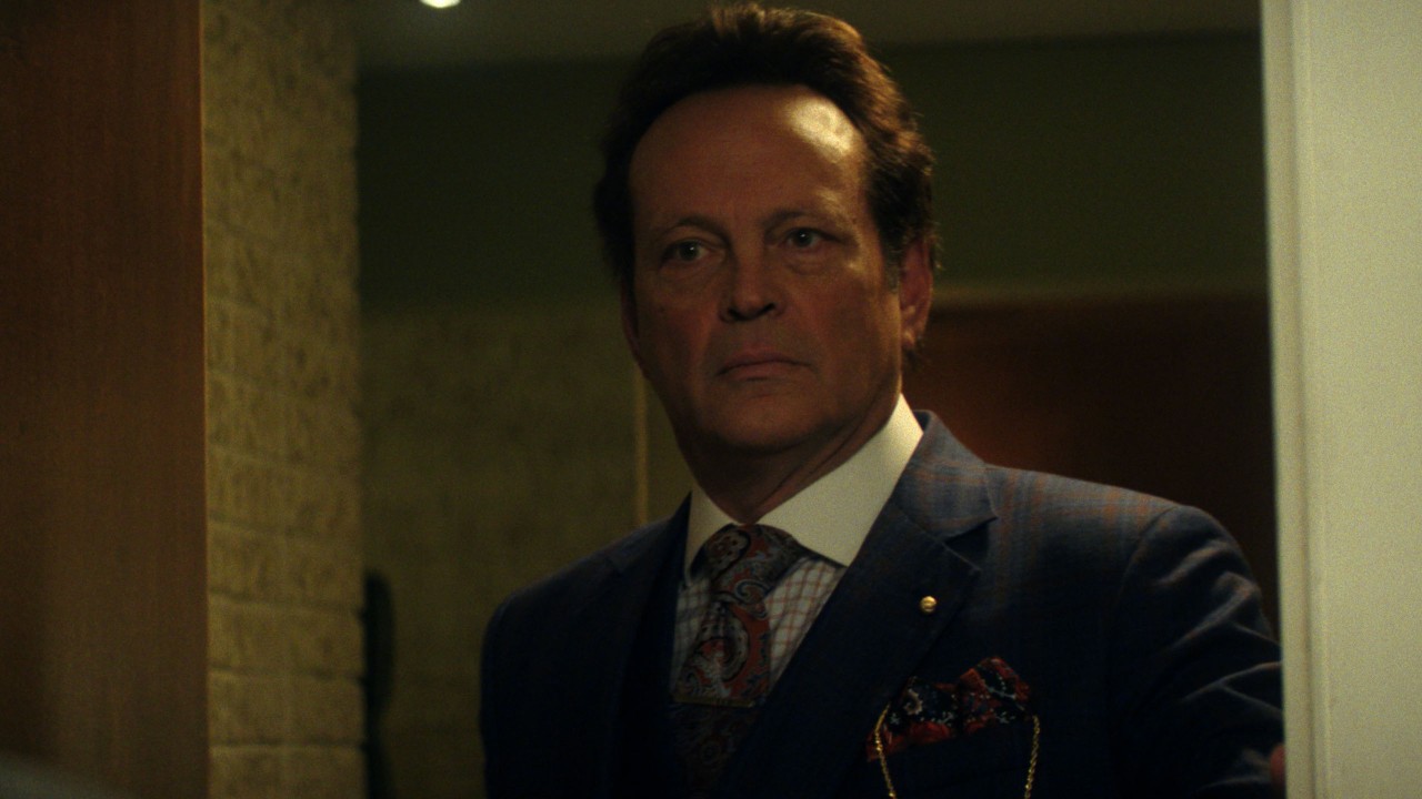 Nick (Vince Vaughn) looks at Mike from the doorway in Mike &amp; Nick &amp; Nick &amp; Alice.