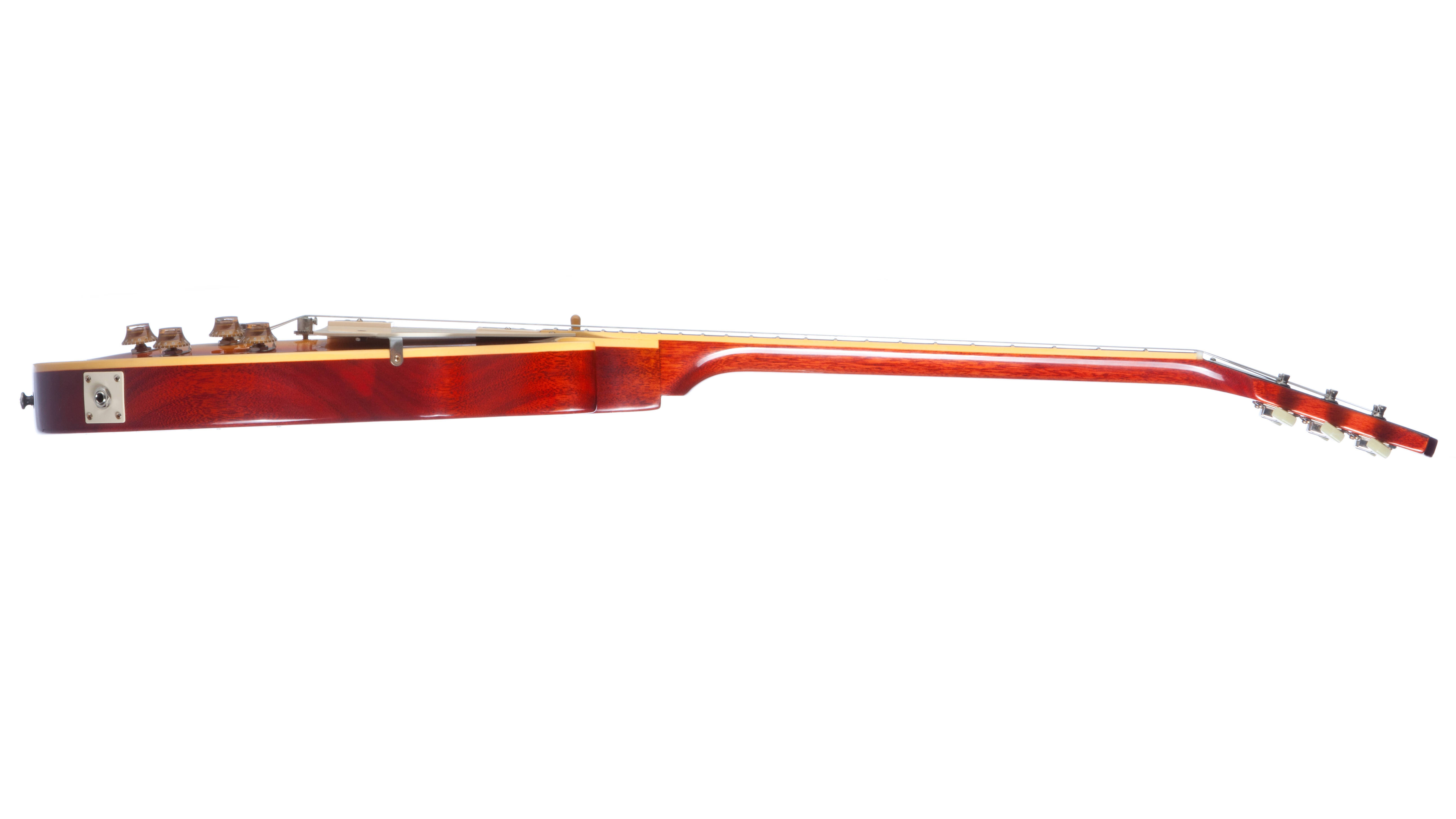 That's a slap of mahogany with a two-piece maple top and specially formulated finish