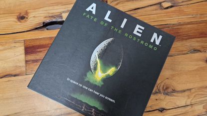 Alien: Fate of the Nostromo box on a wooden surface