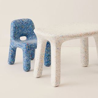 A children's speckled table and chair set for the best sustainable furniture brands.