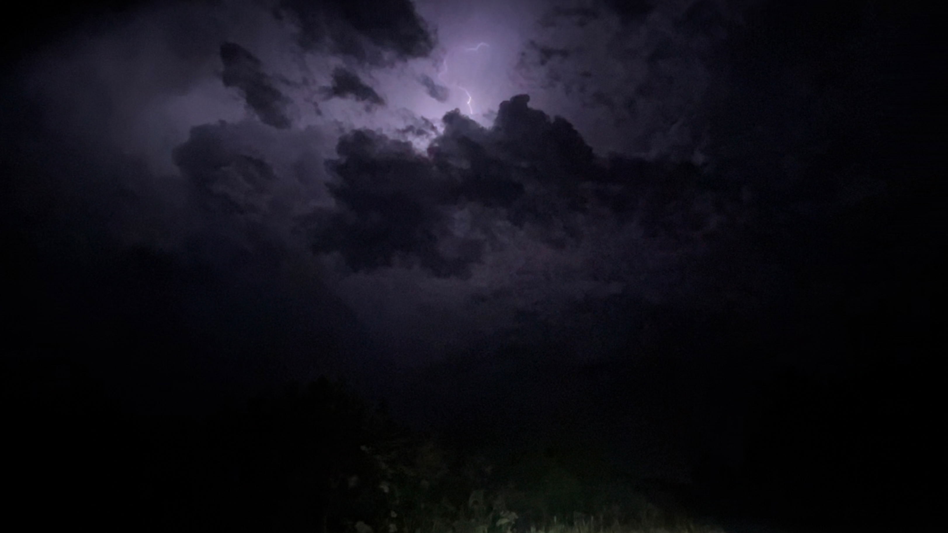 Lightning storm photos taken on an iPhone 13 Mini
