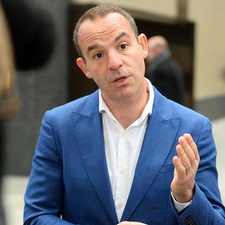 martin lewis with white shirt and blue blazer