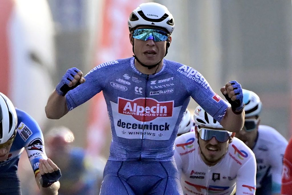 Alpecin-Deceuninck's Belgian rider Jasper Philipsen reacts as he crosses the finish line to win the 'Classic Brugge-De Panne' men's elite one-day cycling race, 198,9 km from Brugge to De Panne on March 20, 2024. (Photo by DIRK WAEM / Belga / AFP) / Belgium OUT