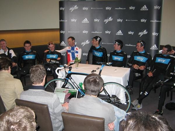 Sky riders share a joke during the press conference