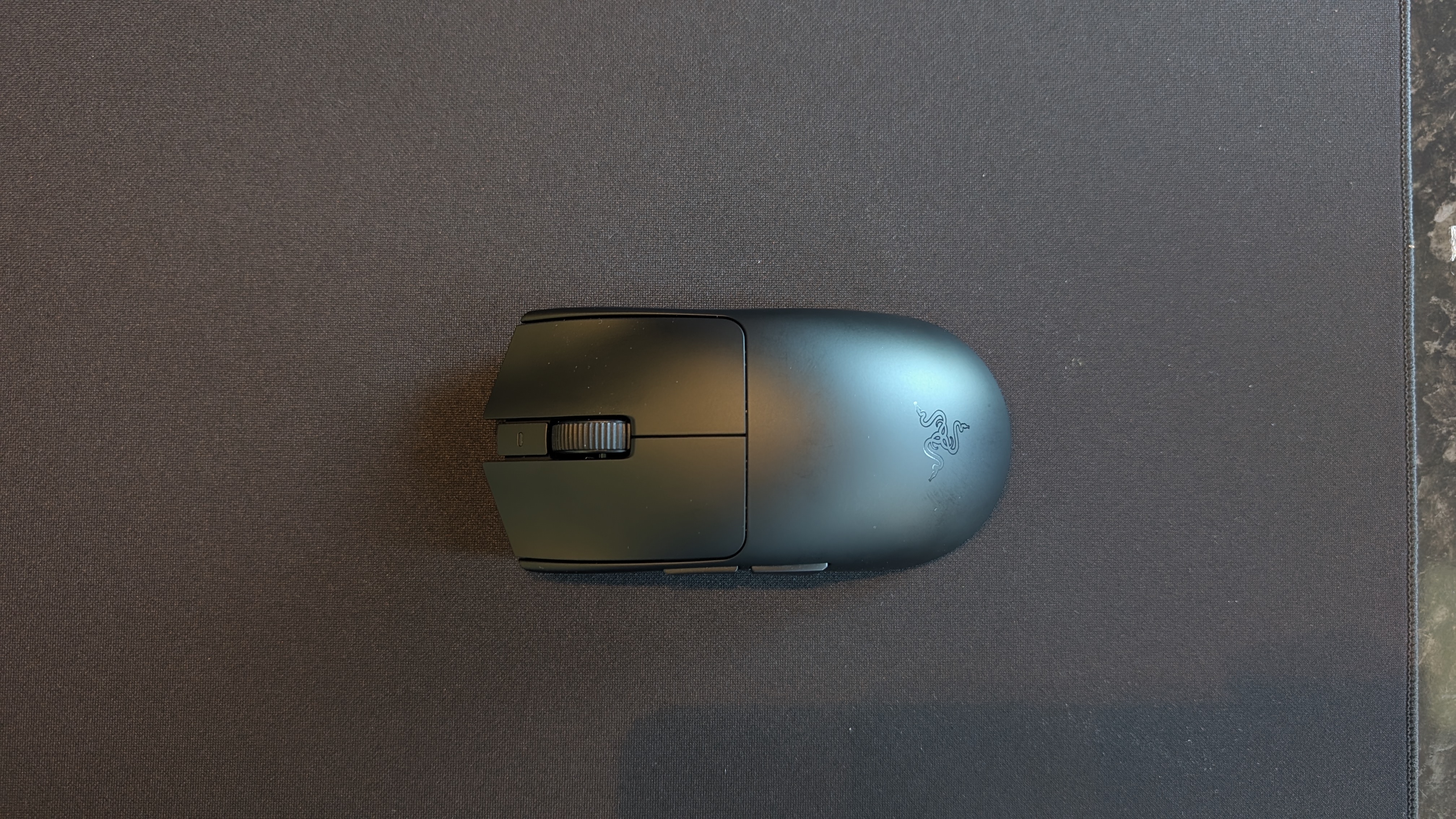 The Razer Viper V4 Pro gaming mouse pictured on the Razer Gigantus V2 Pro mouse mat.