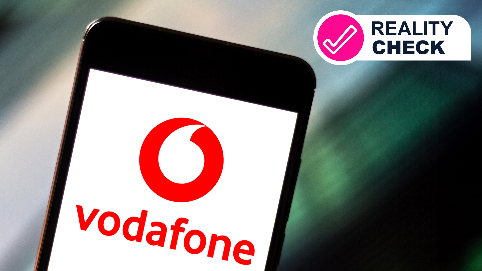 A mobile phone showing the Vodafone logo