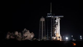  A SpaceX Falcon 9 rocket with the company’s Crew Dragon spacecraft onboard is seen on the pad at Launch Complex 39A during a brief static fire test at NASA’s Kennedy Space Center in Florida on Oct. 28, 2021, ahead of the Crew-3 mission.