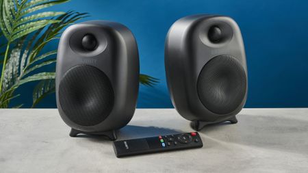 the majority d80 speakers, a pair of black egg-shaped speakers with mesh casing, HDMI, bluetooth, aux connectivity 