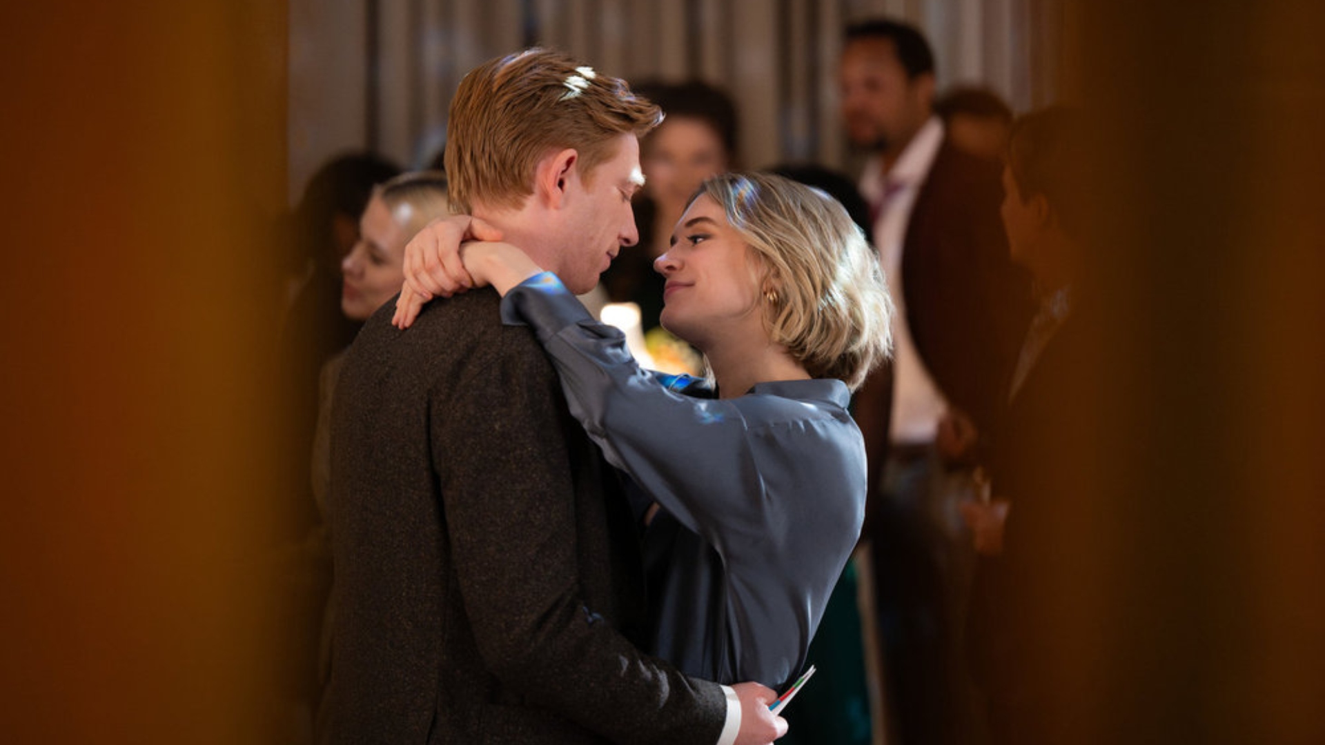 Domhnall Gleeson and Chelsea Frei in "The Paper"