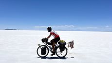 Image shows James Benson-King crossing salt flats