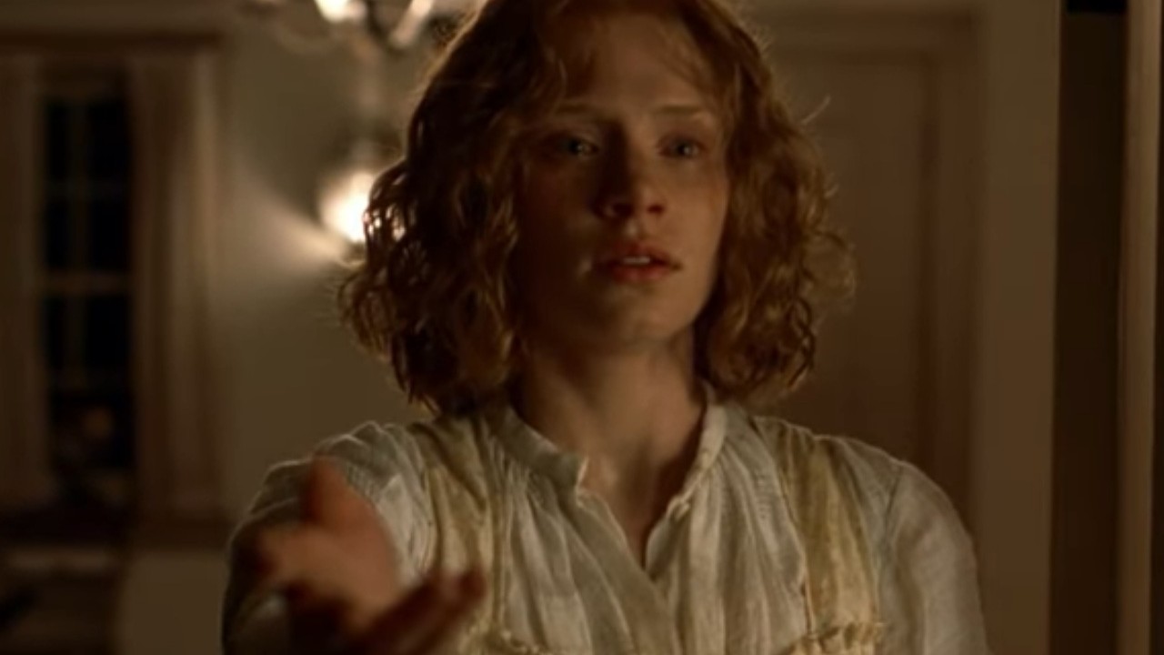 Bryce Dallas Howard with her hand extended in The Village