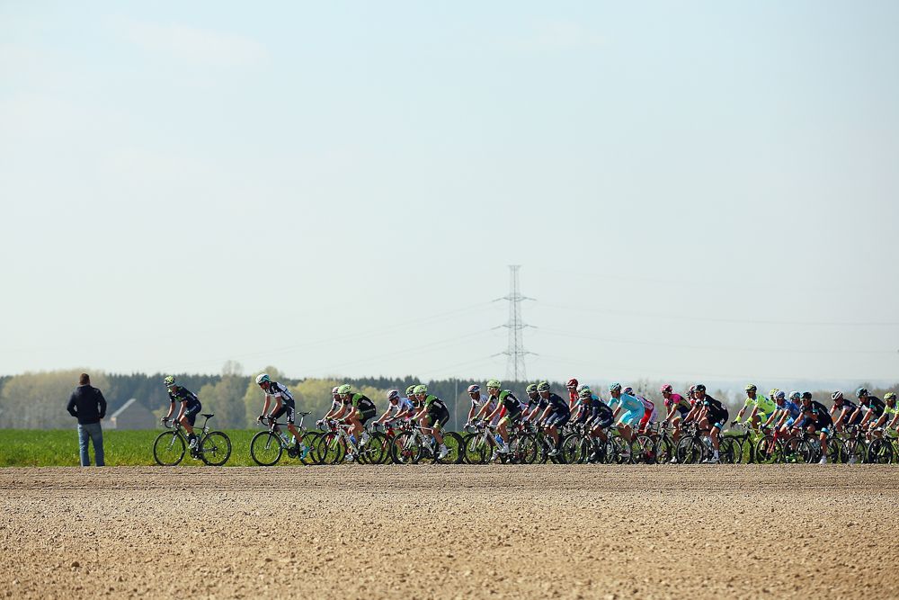 : The peloton rides through the Belgian countryside during the 79th La Fleche Wallonne.