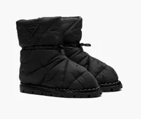 Prada, Padded nylon booties, $1,150 | &nbsp;£920&nbsp;
