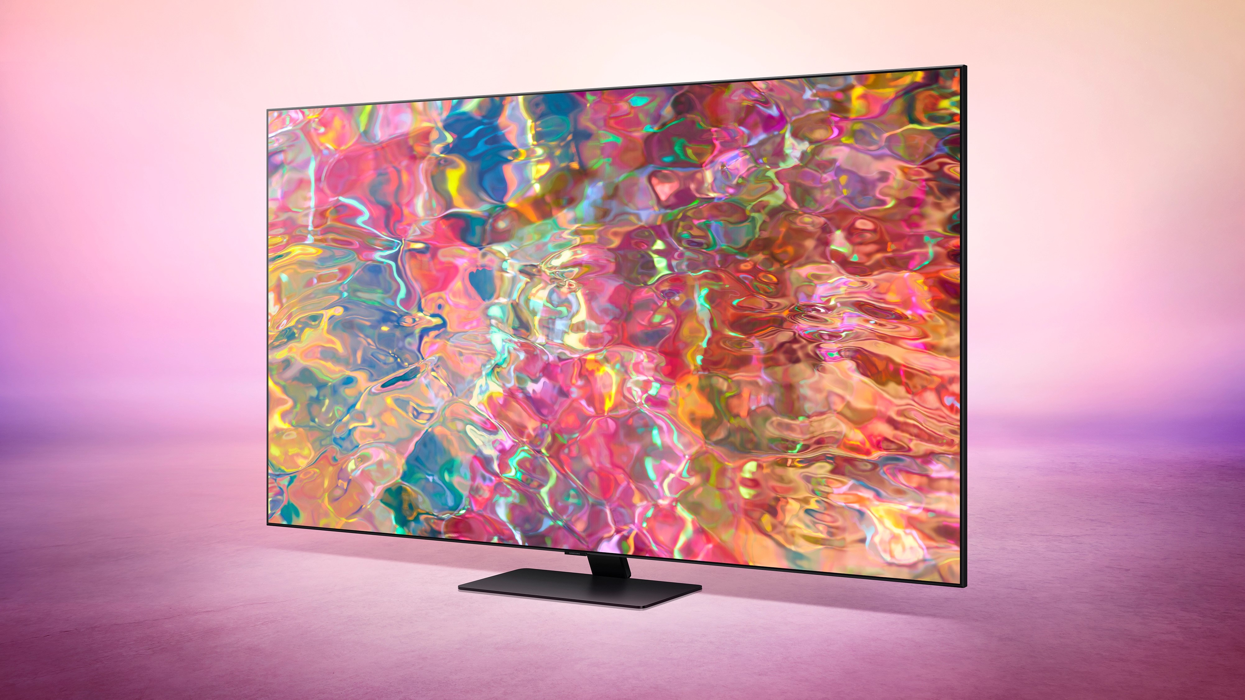 Samsung Q80B TV on pink background