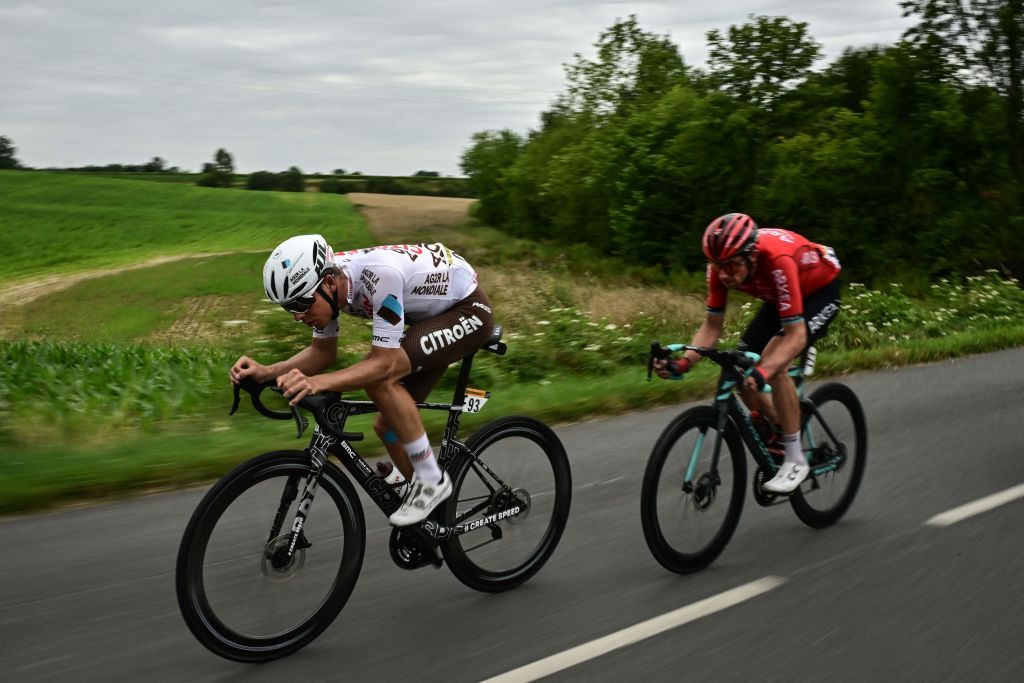 AG2R Citroen Teams French rider Benoit Cosnefroy L and Team Arkea Samsics French rider Anthony Delaplace R cycle in a breakaway during the 4th stage of the 110th edition of the Tour de France cycling race 182 km between Dax and Nogaro in southwestern France on July 4 2023 Photo by Marco BERTORELLO AFP Photo by MARCO BERTORELLOAFP via Getty Images