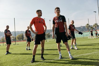 Geraint Thomas with OGC Nice midfielder Aaron Ramsay