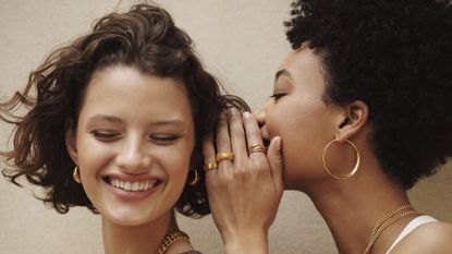 two woman wearing monica vinader jewelry