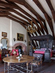 Fig 2: The James I bedroom is in the older part of the house, where part of the roof of the refectory range survives. Beeleigh Abbey, Essex. Photographed by Paul Highnam for Country Life Magazine. ©Country Life