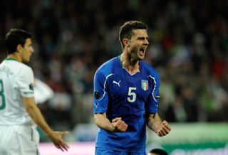 Thiago Motta celebrates after scoring for Italy against Slovenia in March 2011.