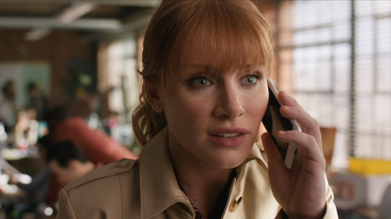 Bryce Dallas Howard takes an important phone call in the office in Jurassic World: Fallen Kingdom.