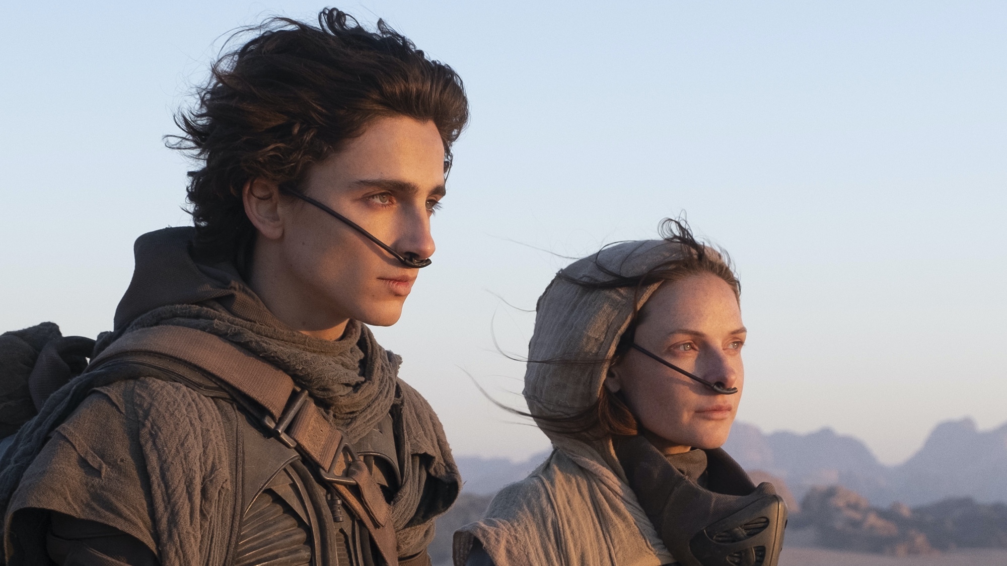 Timothée Chalamet and Rebecca Ferguson in the dunes