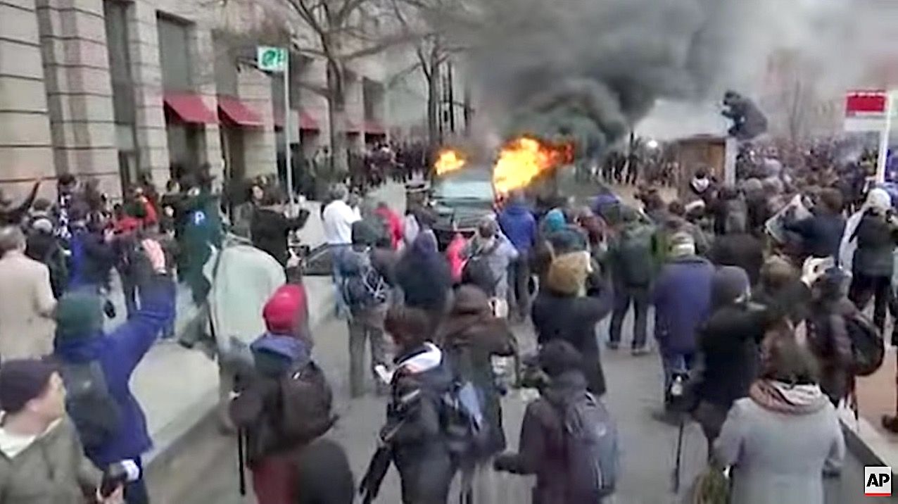 Anti-Trump protesters torch a limo in D.C.