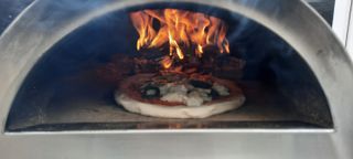 Cooking pizza in the delivita
