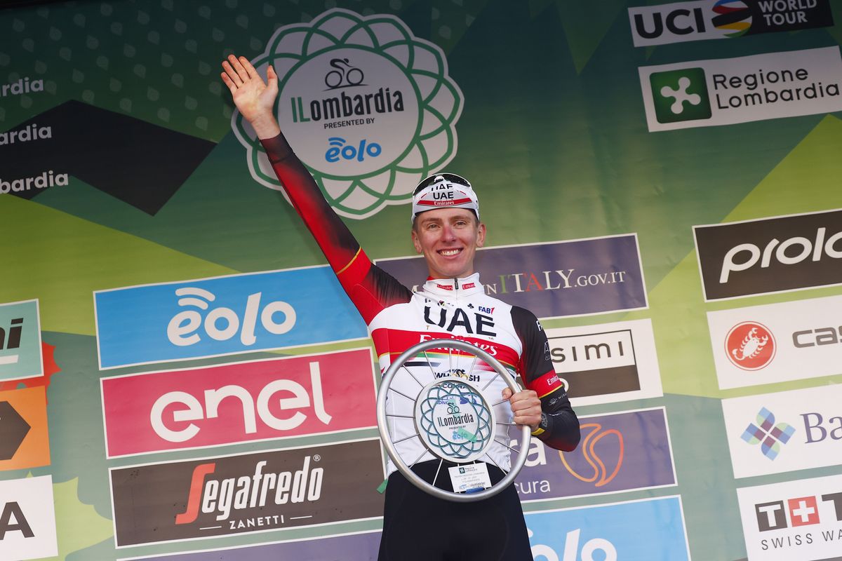 Tadej Pogacar (UAE Team Emirates) winner of the 2021 Il Lombardia celebrates on the podium