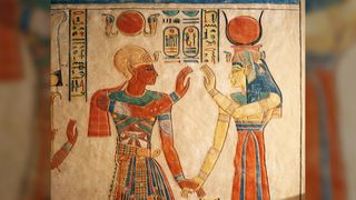 An ancient Egyptian painted relief depicting Pharaoh Ramesses III with Isis.