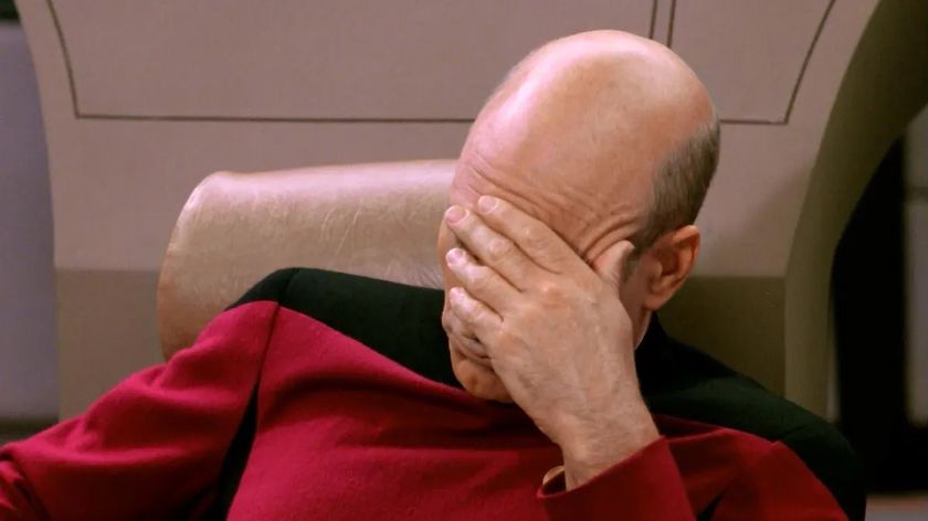 Captain Picard facepalming. 