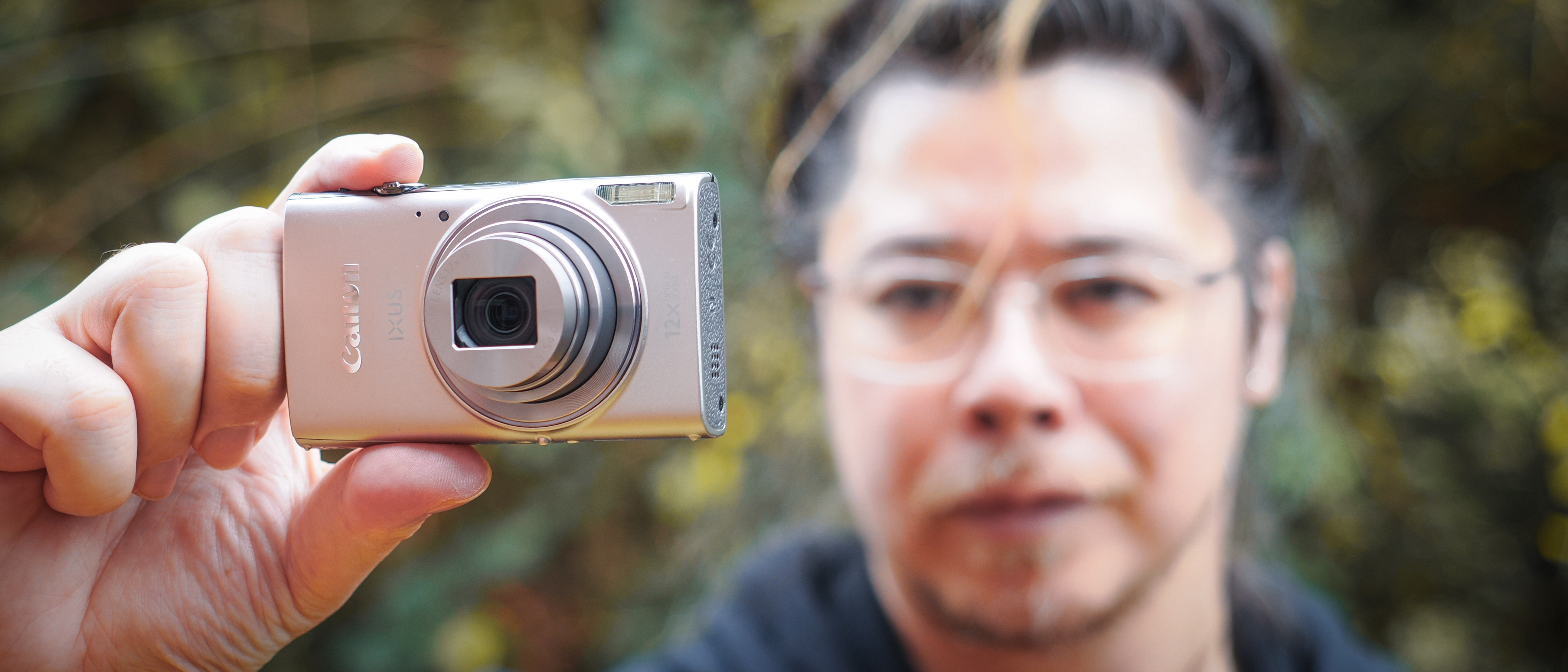 Canon PowerShot Elph 360 HS A / Canon Ixus 285 HS A being held by photographer James Artaius