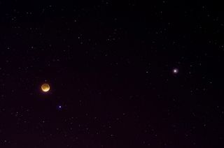 Astrophotographer Jake Gillespie sent in an image of the total lunar eclipse and Mars taken from Tucson, Arizona, on April 15, 2014.
