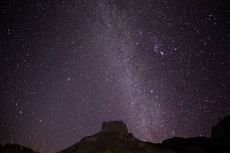 The night sky over a rock formation at Big Bend National Park in Texas
