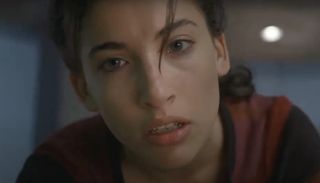 Tania Raymonde leans forward with a face of urgency in Lost.