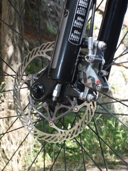 The Avid XX rotor uses a stainless steel brake track for proper stopping power but an alloy carrier for reduced weight.