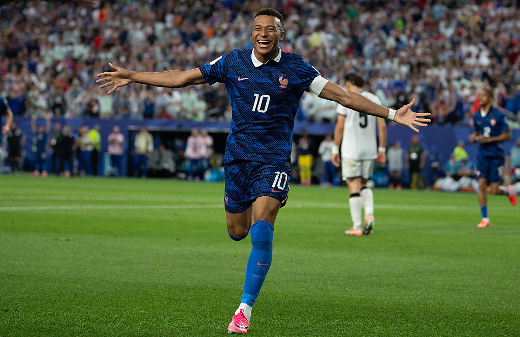Kylian Mbappe of France celebrates Ousmane Dembele's goal during the FIFA World Cup 2026 Group I match between France and Iraq.