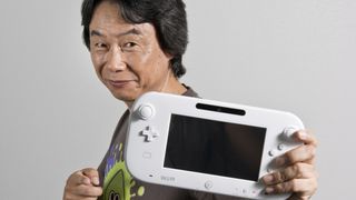 Shigeru Miyamoto with the Wii U tablet controller.