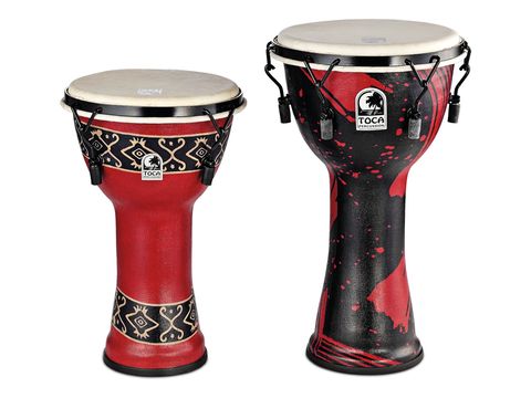 The djembes are made from a lightweight and durable synthetic material, moulded into shape.