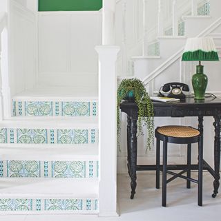 Green stair risers in white staircase