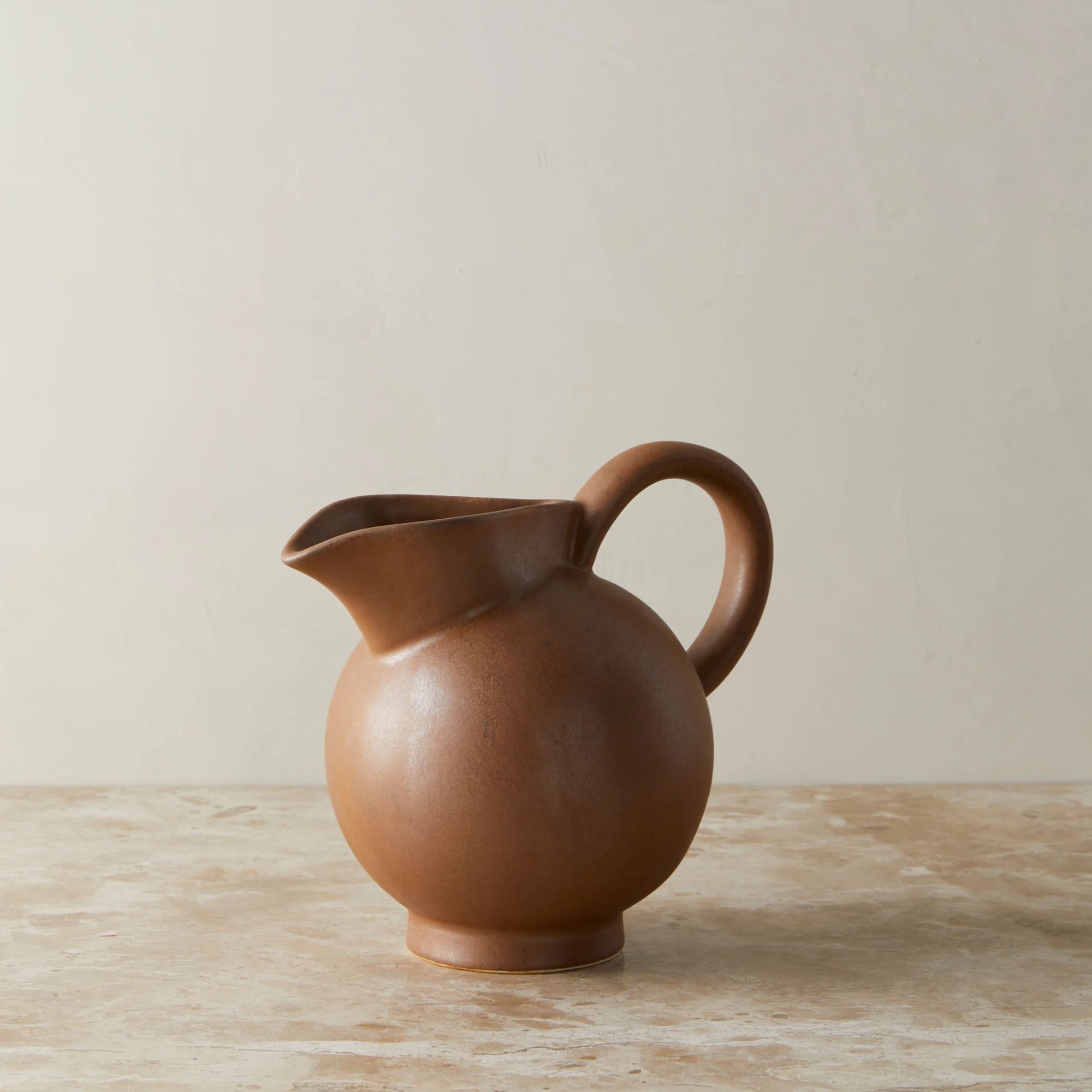 Brown stoneware pitcher