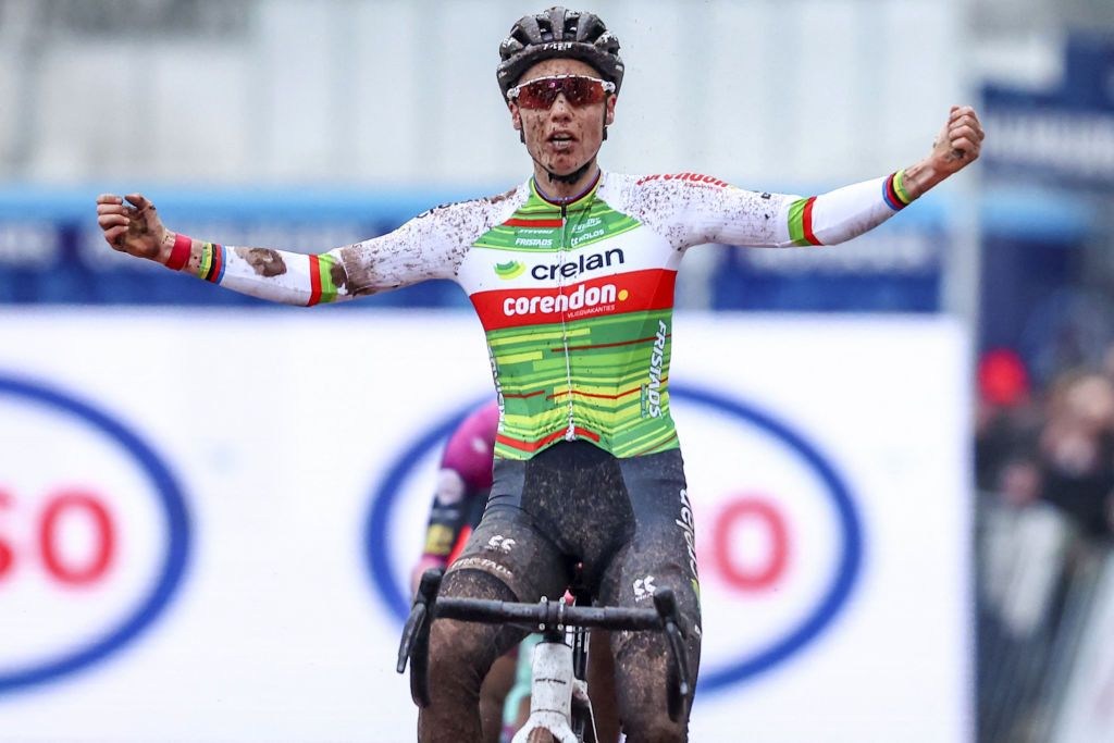 Belgium's Sanne Cant celebrates as she crosses the finish line to win the women's elite and U23 race at the Belgian Championships cyclocross cycling race in Meulebeke, January 13, 2024. (Photo by DAVID PINTENS / Belga / AFP) / Belgium OUT