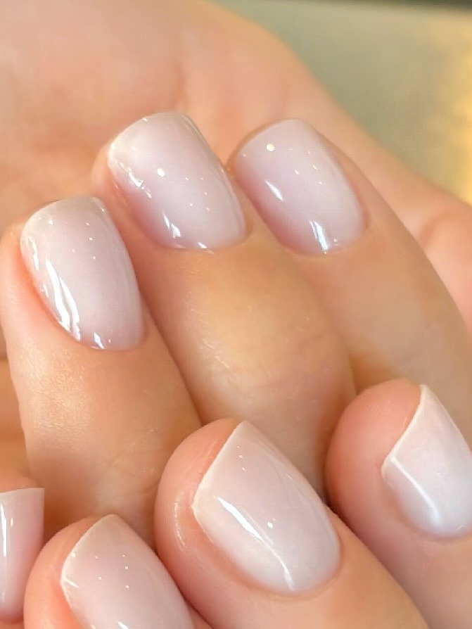 A close-up of milky nails by Harriet Westmoreland