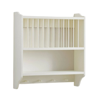 A white plate rack wall fixture