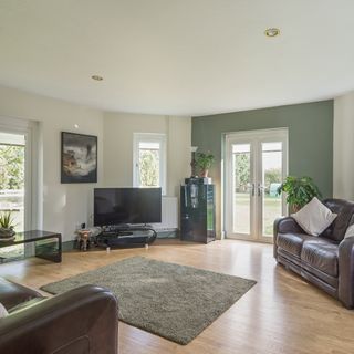 smock tower mill living room with wooden floor