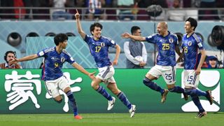 Japan’s Ao Tanaka celebrates his winning goal against Spain